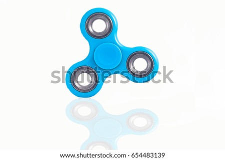 Fidget Spinner in white isolated background for stress release during work