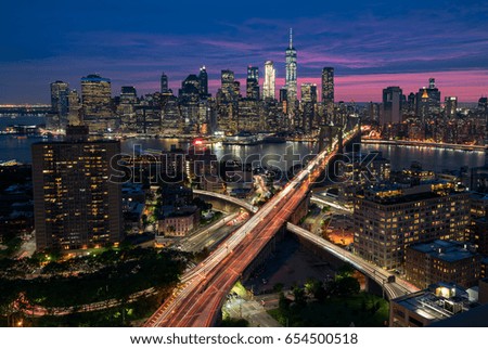 Manhattan and Brooklyn skyline at dusk, New York City.