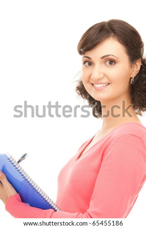 picture of a young attractive businesswoman with notebook