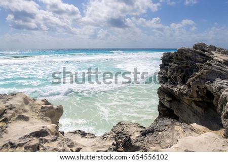 View to the sea on a sunny summer day in the shore of the Caribbean sea. Turquoise water and beautiful beaches. Vacation concept image.