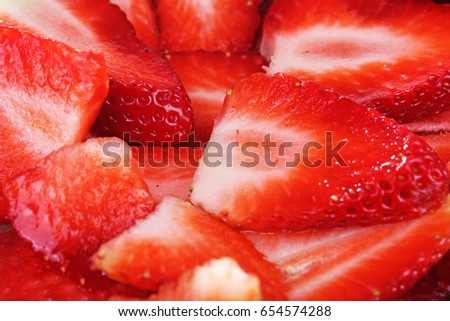 Beautiful red strawberry background. Strawberries pattern as wallpaper. Fresh strawberry  texture.