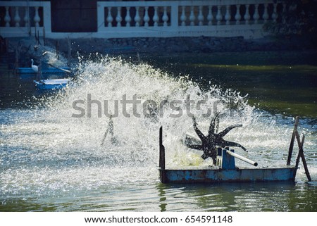 paddle wheel aerator.Spinning water until the foam is visible to the propeller.