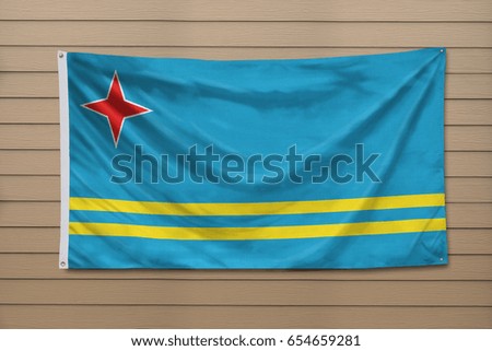 Aruba flag hanging on a wall