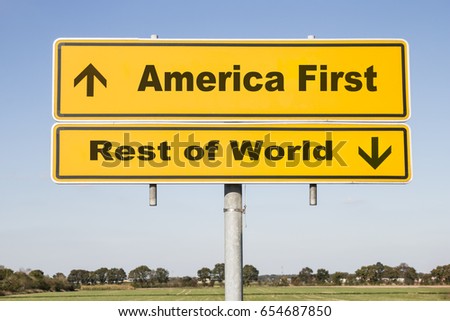 yellow traffic and direction sign with two arrows showing up and down and the words America first and Rest of world. Concept concerning politics of US President Donald Trump