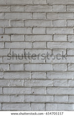 Old white brick wall. That picture can use as a background.