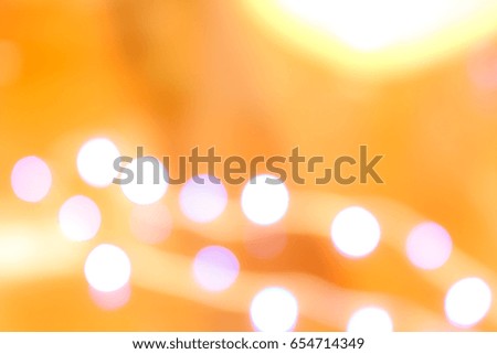 Blur of bokeh with orange color background