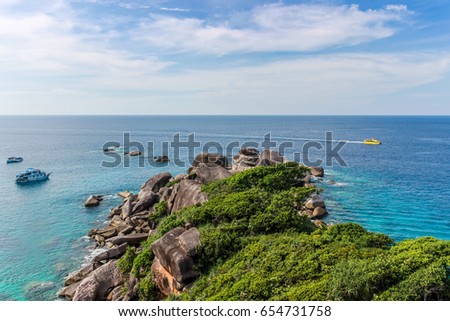 Similan is beautiful island in Thailand. I went up to top of hill. I took to photo of brae covered by plant. Blue water is very amazing there. It will make you will be one of nature. 
