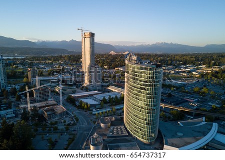 Surrey City Centre, Greater Vancouver, British Columbia, Canada. Taken from an aerial perspective during sunset. Royalty-Free Stock Photo #654737317