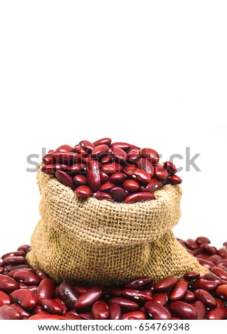 Red bean or red kidney bean in hemp sack isolated on white background. red beans are beneficial support heart health, cholesterol-free source of high-quality plant protein beans.
