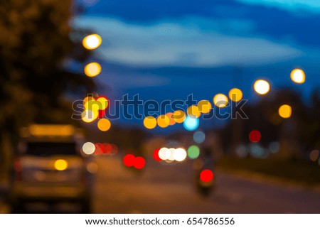 Blurred of car in city at night.Night-Blurred Photo blur bokeh background defocused lights.