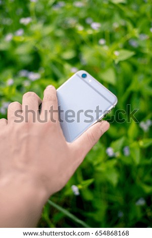 Selective focus hand holding smart phone white screen. business concept and technology concept.