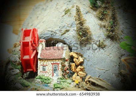 Miniature of watermill and house model.