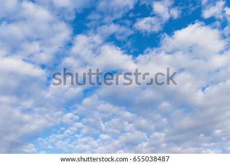 Cirrus and cumulus clouds, blue sky