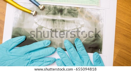 dental tools on wooden background. Medical service concept