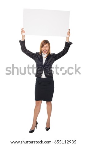 Beautiful Asian woman in black business suit holding a white board