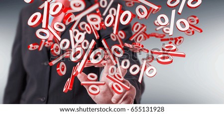 Businessman on blurred background using white and red sales flying icons 3D rendering
