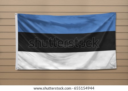 Estonian Flag hanging on a wall