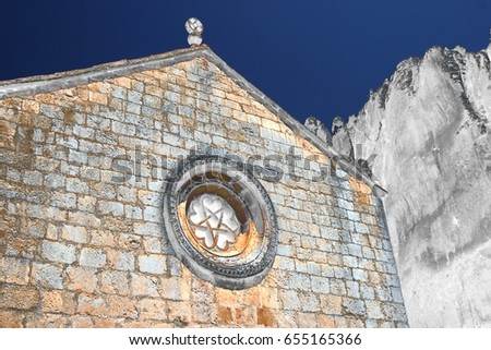 homage to Dalí, surrealistic photography, of Church of San Bartolomé, , Soria, Spain, natural park of the canyon of the river lobos, Romanesque rosette,photography of the subconscious,dreams photo,