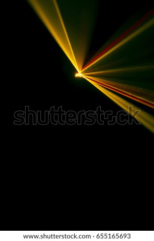 Laser beam tilt orange on a black background 