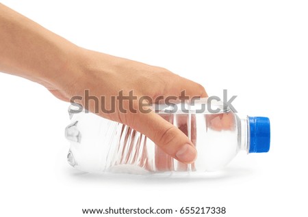Female hand holds clean and fresh water packed in a plastic bottle. Isolated on white background