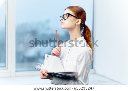 Business woman, business woman with glasses and a notebook