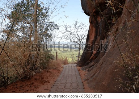 Brown pathway is the smile of mountain.