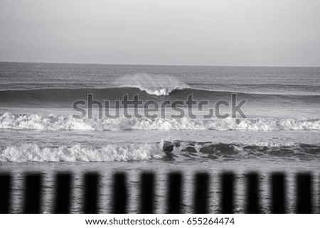 beach scenery with a breaking wave