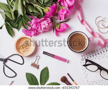 Pink peonies and cute woman's accessories, top view