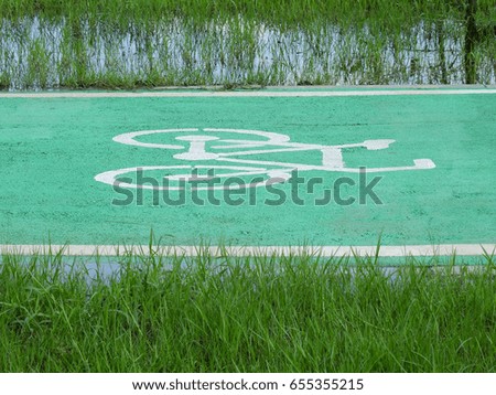  Bicycle path sign on the asphalt road