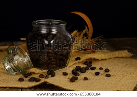 Roasted Coffee beans on wooden background