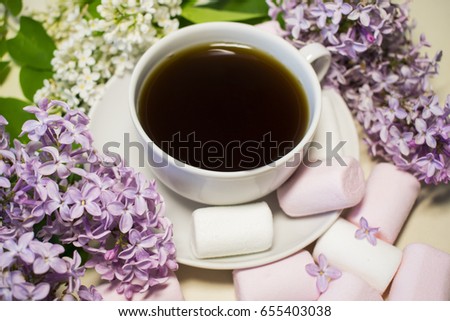 Flowers and morning coffee. Tasty breakfast. Light background