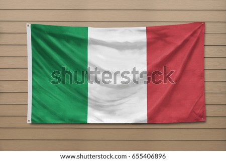 Italy Flag hanging on a wall