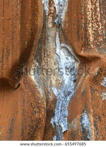 Rusted metal after fire
