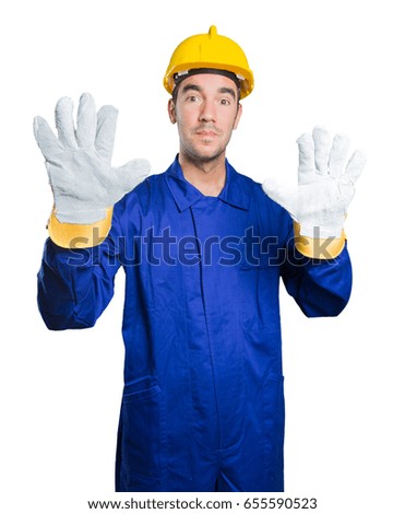 Confident workman on white background