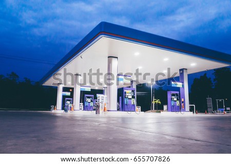 Gas station at night time Royalty-Free Stock Photo #655707826