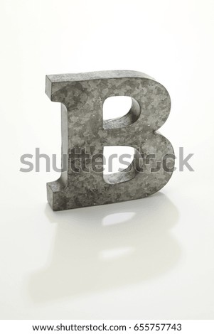 iron letter B isolated on white