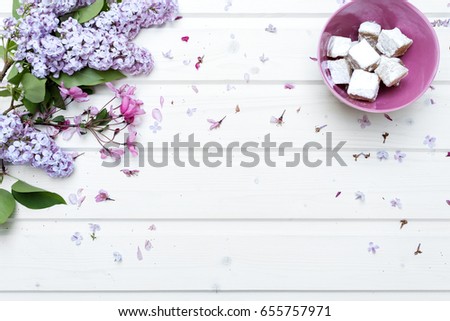 Blank white ship deck tabletop with spring flowers