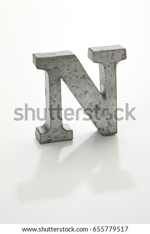 iron letter N isolated on white