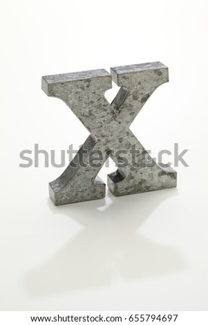 iron letter X isolated on white