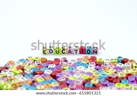 word education spell using colorful beads isolated on white background.concept image.