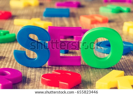SEO word made of colorful magnets. Search engine optimization