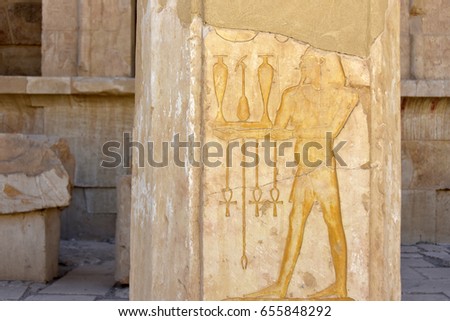 Figures of ancient people on stone