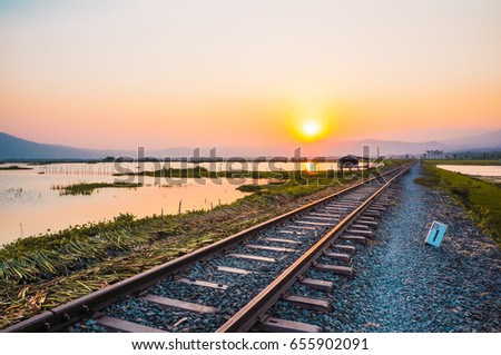 Railway to Sunset around Rawa Pening Lake, Semarang, Central Java Indonesia