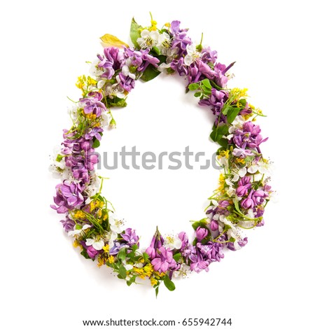 The letter "O" made of various natural small flowers.
