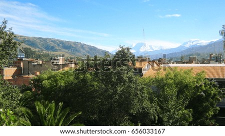 morning view of the city and the andean mountain range
