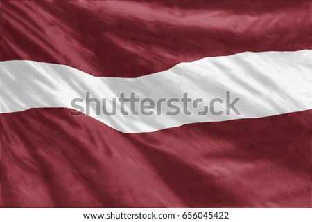 Latvia Flag hanging on a wall