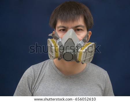 Men protection cartridge respirator gas mask - close up.