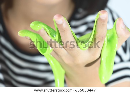 Kid Playing Hand Made Toy Called Slime, Selective focus on Slime