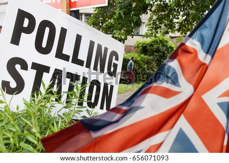 polling station sign and Union Jack flag - UK general elections