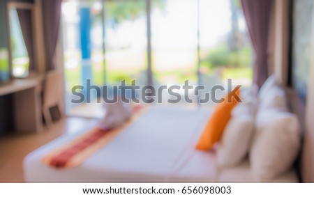 Abstract blur image of Bedroom decorated interior with bokeh for background usage . (vintage tone)